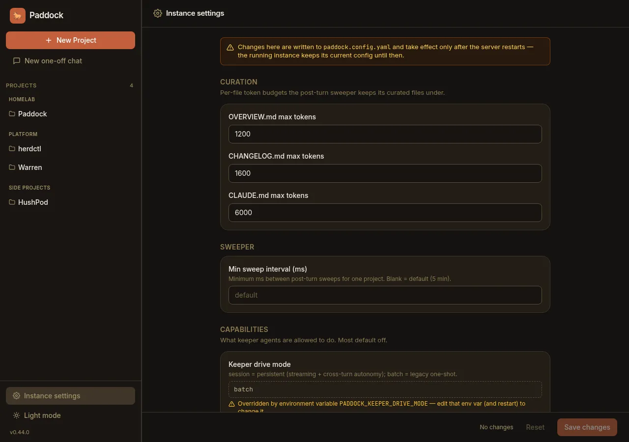 The instance-wide Settings screen, editing paddock.config.yaml from the UI with a restart-to-apply banner